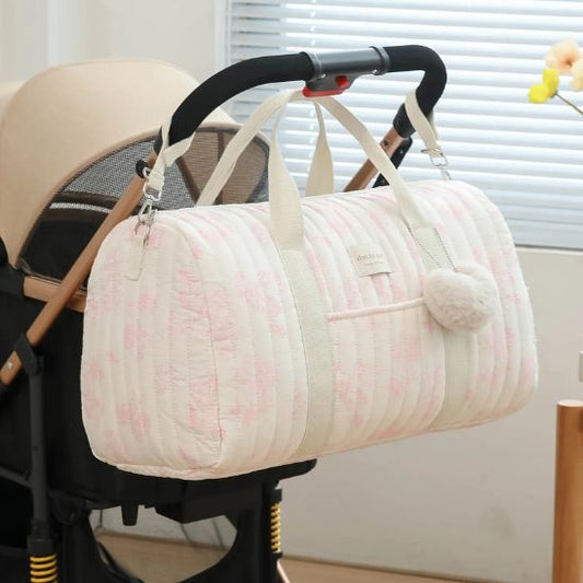 sac-a-langer-pour-nouveau-ne-rose-a-fleurs