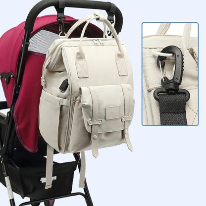 sac-à-dos-à-langer-mummy-bag-accroche-poussette